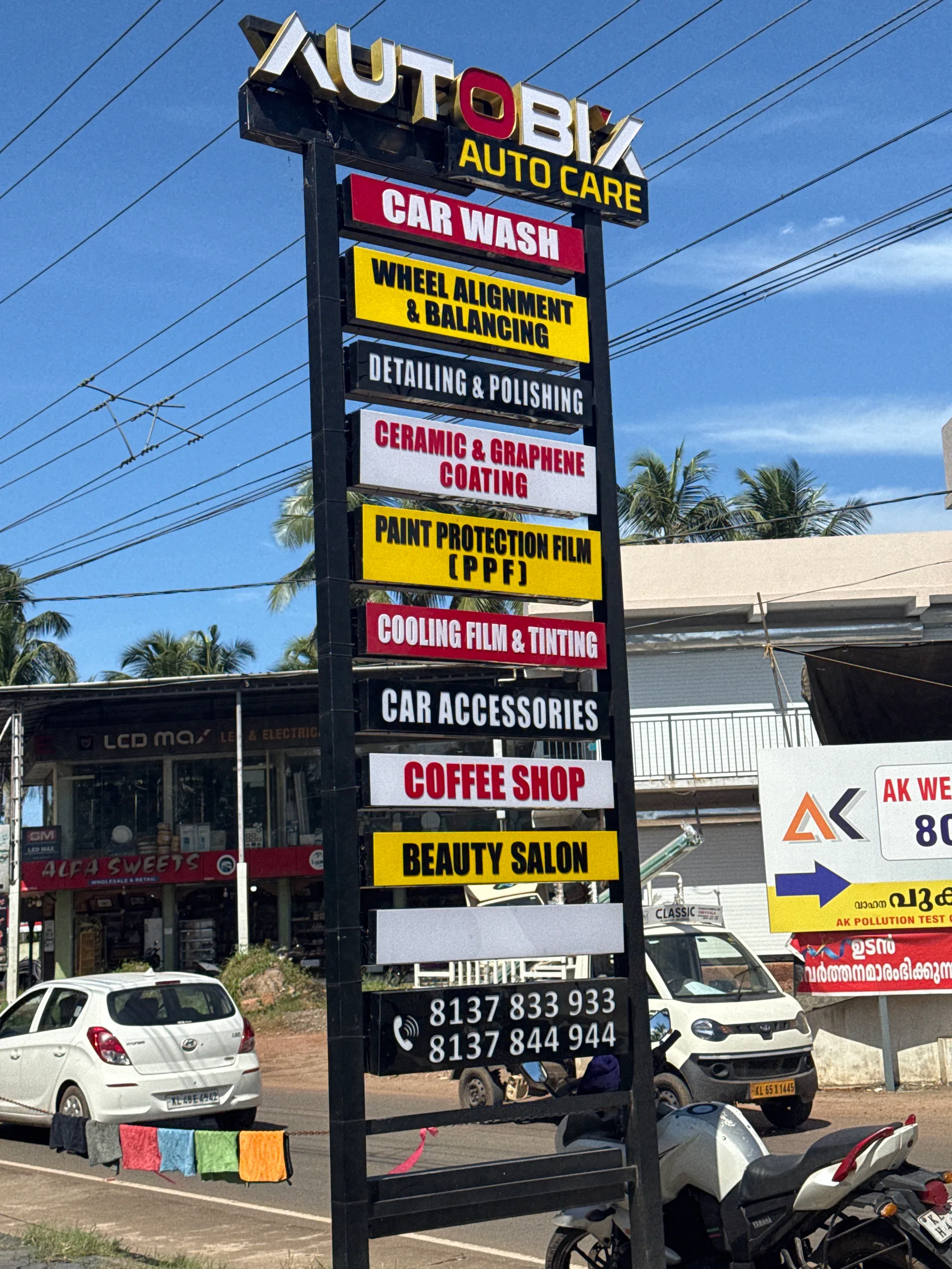 The AUTOBIX pylon sign listing every service offered at the centre