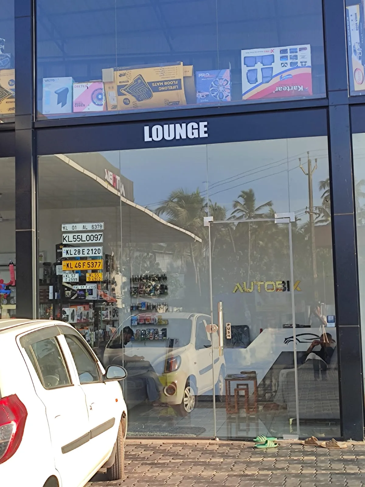 The glass-fronted lounge and accessories entrance at AUTOBIX